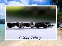 Silver Sea Collection / Bracelet Peace & Love / Argent 925 (0.43g) D:6.90mm / Perle Ronde de Tahiti 8.10mm/D Gris / Taille Réglable Coton Noir (photos non Contractuelles)
